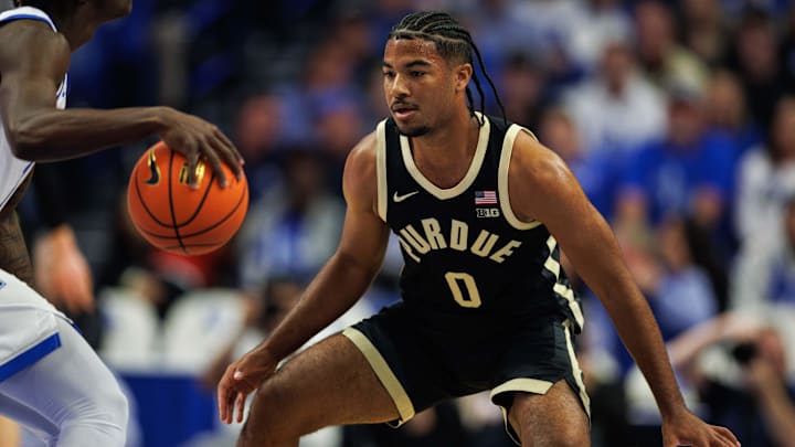 Purdue Boilermakers guard C.J. Cox (0) defends 