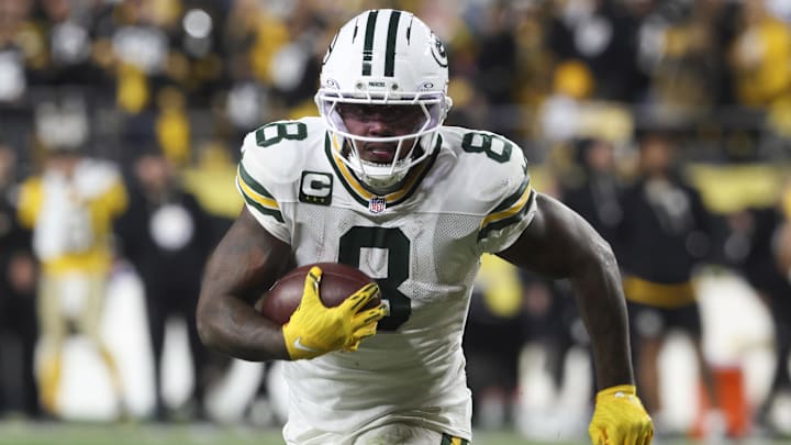 Oct 26, 2025; Pittsburgh, Pennsylvania, USA; Green Bay Packers running back Josh Jacobs (8)  runs for a touchdown against the Pittsburgh Steelers during the fourth quarter at Acrisure Stadium. 