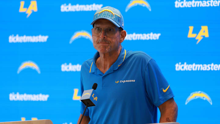 Jul 24, 2024; El Segundo, CA, USA;  Los Angeles Chargers head coach Jim Harbaugh speaks to the media after the first day of training camp at The Bolt.