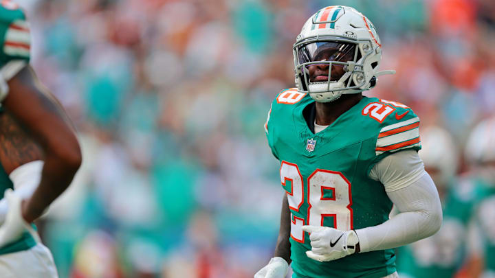 Miami Dolphins running back De'Von Achane (28) reacts after scoring a touchdown during the first quarter against the Cincinnati Bengals at Hard Rock Stadium last December. Miami Dolphins running back De'Von Achane (28) reacts after scoring a touchdown during the first quarter against the Cincinnati Bengals at Hard Rock Stadium last December.