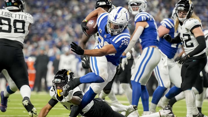 Jan 5, 2025; Indianapolis, Indiana, USA; Indianapolis Colts running back Jonathan Taylor (28) rushes for a touchdown during a game against the Jacksonville Jaguar at Lucas Oil Stadium. Mandatory Credit: Grace Hollars/USA TODAY Network via Imagn Images Jan 5, 2025; Indianapolis, Indiana, USA; Indianapolis Colts running back Jonathan Taylor (28) rushes for a touchdown during a game against the Jacksonville Jaguar at Lucas Oil Stadium. Mandatory Credit: Grace Hollars/USA TODAY Network via Imagn Images