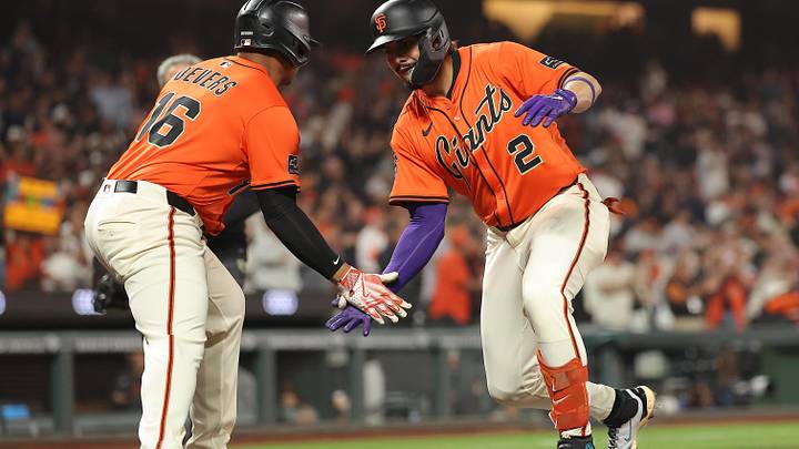 Sep 26, 2025; San Francisco, California, USA; San Francisco Giants shortstop Willy Adames (2) high fives designated hitter Rafael Devers (16) after batting him in on a two-run home run against the Colorado Rockies during the first inning at Oracle Park. Mandatory Credit: Kelley L Cox-Imagn Images