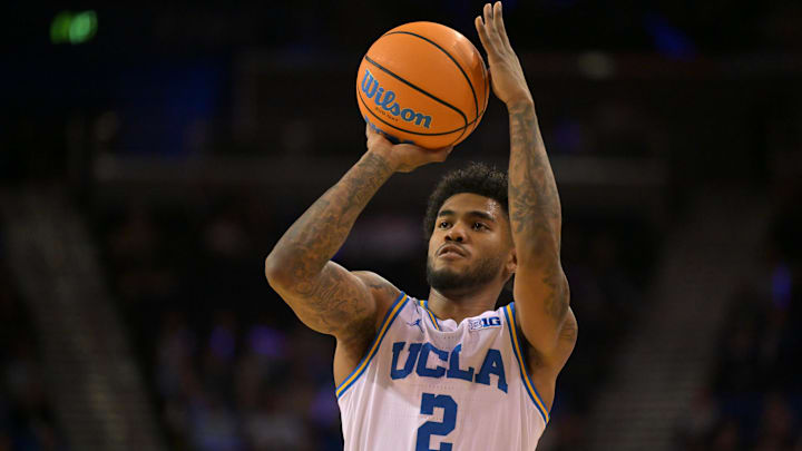 Feb 7, 2026; Los Angeles, California, USA;  UCLA Bruins guard Donovan Dent (2) shoots the ball in the first half against the Washington Huskies at Pauley Pavilion presented by Wescom Financial. Mandatory Credit: Jayne Kamin-Oncea-Imagn Images