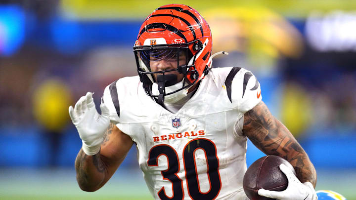 Nov 17, 2024; Inglewood, California, USA; Cincinnati Bengals running back Chase Brown (30) carries the ball against the Los Angeles Chargers in the second half at SoFi Stadium. Mandatory Credit: Kirby Lee-Imagn Images