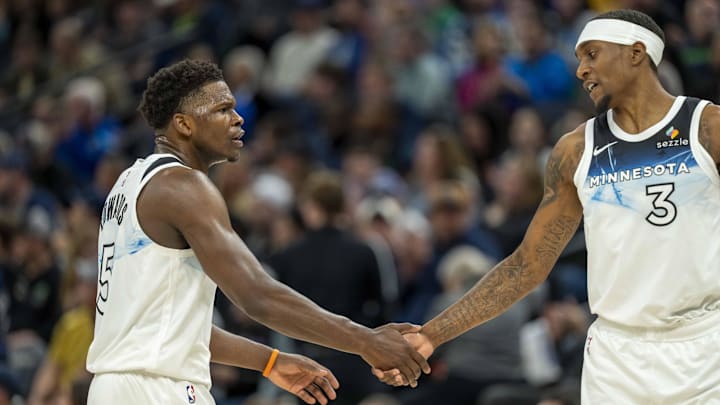 Mar 9, 2025; Minneapolis, Minnesota, USA; Minnesota Timberwolves guard Anthony Edwards (5) shakes hands with forward Jaden McDaniels (3) after making a shot against the San Antonio Spurs in the first half at Target Center. Mar 9, 2025; Minneapolis, Minnesota, USA; Minnesota Timberwolves guard Anthony Edwards (5) shakes hands with forward Jaden McDaniels (3) after making a shot against the San Antonio Spurs in the first half at Target Center.