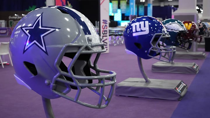 Feb 9, 2024; Las Vegas, NV, USA; Large Dallas Cowboys and New York Giants helmets at the NFL Experience at the Mandalay Bay South Convention Center. Mandatory Credit: Kirby Lee-Imagn Images