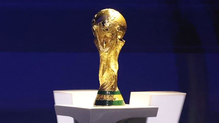 Dec 5, 2025; Washington, District of Columbia, USA; The World Cup trophy sits on a podium during the FIFA World Cup 2026 Final Draw at John F. Kennedy Center for the Performing Arts. Mandatory Credit: Amber Searls-Imagn Images