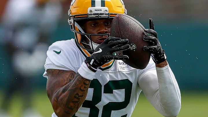 Green Bay Packers running back MarShawn Lloyd (32) catches a pitch during the first day of training camp on Wednesday, July 23, 2025, at Ray Nitschke Field in Ashwaubenon, Wis. 
Tork Mason/USA TODAY NETWORK-Wisconsin