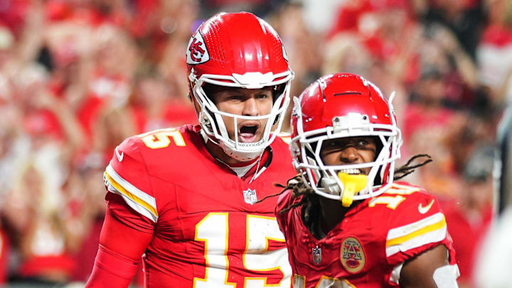 Kansas City Chiefs starting quarterback Patrick Mahomes and running back Isiah Pacheco celebrate after a touchdown.