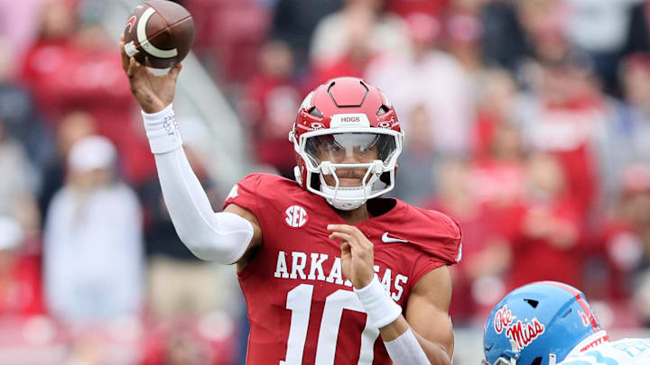 Arkansas Razorbacks quarterback Taylen Green (10) passes in the first quarter against the Ole Miss Rebels at Donald W. Reynolds Razorback Stadium. 