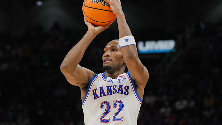 Dec 7, 2025; Kansas City, Missouri, USA; Kansas Jayhawks guard Darryn Peterson (22) shoots during the first half against the Missouri Tigers at T-Mobile Center. Mandatory Credit: Jay Biggerstaff-Imagn Images