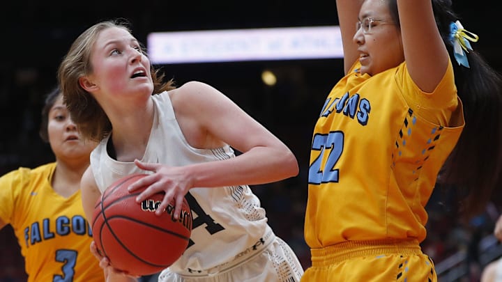 Scottsdale Christian's Payton Kolar (44) goes up for a shot against Alchesay's Laney Lupe (22) during the first half of the 2A girls basketball state championship game at Gila River Arena in Glendale, Ariz. on February 23, 2019.

Z6i4932