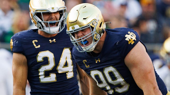 Notre Dame defensive lineman Rylie Mills (99) and linebacker Jack Kiser (24) celebrate a sack by Mills during a NCAA college football game between Notre Dame and Stanford at Notre Dame Stadium on Saturday, Oct. 12, 2024, in South Bend. Notre Dame defensive lineman Rylie Mills (99) and linebacker Jack Kiser (24) celebrate a sack by Mills during a NCAA college football game between Notre Dame and Stanford at Notre Dame Stadium on Saturday, Oct. 12, 2024, in South Bend.