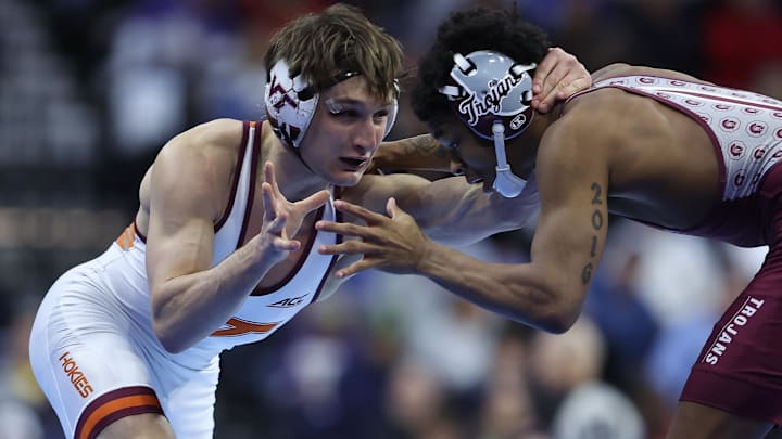 Mar 21, 2025; Philadelphia, PA, USA; Caleb Henson of Virginia Tech wrestles Jordan Williams of Little Rock during day two of the NCAA Wrestling Championships at Wells Fargo Center. Mandatory Credit: Bill Streicher-Imagn Images