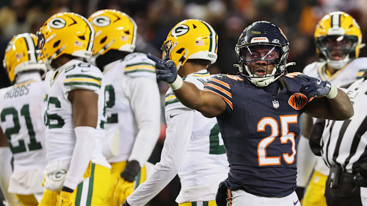 Dec 20, 2025; Chicago, Illinois, USA; Chicago Bears running back Kyle Monangai (25) gestures toward the Green Bay Packers end zone after running for a first down during overtime at Soldier Field. Mandatory Credit: Mike Dinovo-Imagn Images