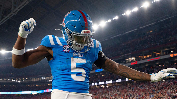 Ole Miss running back Kewan Lacy (5) celebrates after scoreing a touchdown during the CFP Fiesta Bowl against Miami at the State Farm Stadium, in Glendale, Ariz., on Thursday, Jan. 8, 2026.