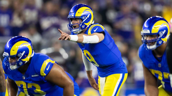 Jan 13, 2025; Glendale, AZ, USA; Los Angeles Rams quarterback Matthew Stafford (9) against the Minnesota Vikings during an NFC wild card game at State Farm Stadium.  