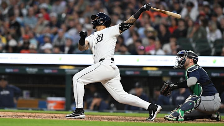 Aug 13, 2024; Detroit, Michigan, USA;  Detroit Tigers shortstop Javier Baez (28) hits a solo home run against the Seattle Mariners in the sixth inning at Comerica Park. 