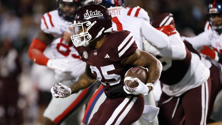 Nov 23, 2023; Starkville, Mississippi, USA; Mississippi State Bulldogs running back Jeffery Pittman (25) runs the ball during the first half against the Mississippi Rebels at Davis Wade Stadium at Scott Field. Mandatory Credit: Petre Thomas-USA TODAY Sports Nov 23, 2023; Starkville, Mississippi, USA; Mississippi State Bulldogs running back Jeffery Pittman (25) runs the ball during the first half against the Mississippi Rebels at Davis Wade Stadium at Scott Field. Mandatory Credit: Petre Thomas-USA TODAY Sports