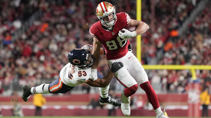 T.J. Edwards tries to bring down 49ers tight end Jake Tonges, a former Bears player, in the first half Sunday night. T.J. Edwards tries to bring down 49ers tight end Jake Tonges, a former Bears player, in the first half Sunday night.