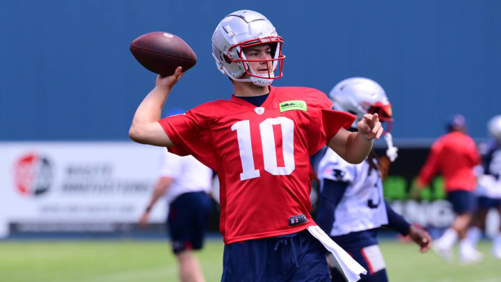 Jun 10, 2024; Foxborough, MA, USA; New England Patriots quarterback Drake Maye (10) throws a pass at minicamp at Gillette Stadium. Mandatory Credit: Eric Canha-USA TODAY Sports