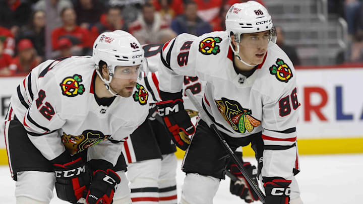 Jan 10, 2025; Detroit, Michigan, USA; Chicago Blackhawks defenseman Nolan Allan (42) and center Teuvo Teravainen (86) look on during the second period at Little Caesars Arena. Mandatory Credit: Brian Bradshaw Sevald-Imagn Images