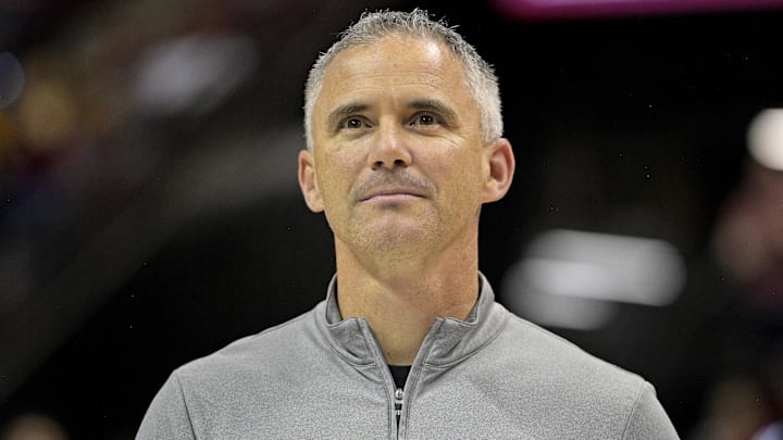 Mar 9, 2024; Tallahassee, Florida, USA; Florida State Seminoles head football coach Mike Norvell accepts the Bear Bryant coach of the Year award during a media timeout of a basketball game against the Miami Hurricanes at Donald L. Tucker Center. Mandatory Credit: Melina Myers-Imagn Images