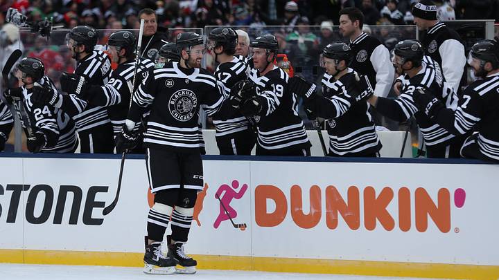 Jan 1, 2019; South Bend, IN, USA; Chicago Blackhawks left wing Brendan Perlini (11) celebrates after scoring a goal against the Boston Bruins in the first period in the 2019 Winter Classic hockey game at Notre Dame Stadium. Mandatory Credit: Aaron Doster-USA TODAY Sports