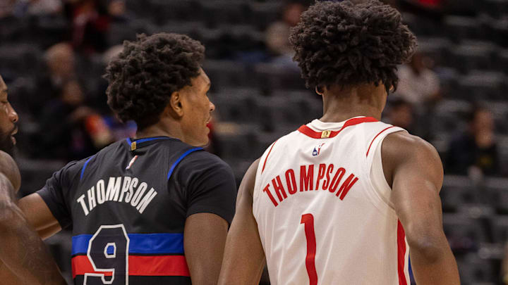 Jan 12, 2024; Detroit, Michigan, USA; Houston Rockets forward Amen Thompson (1) guards his twin Ausar Thompson of the Detroit Pistons