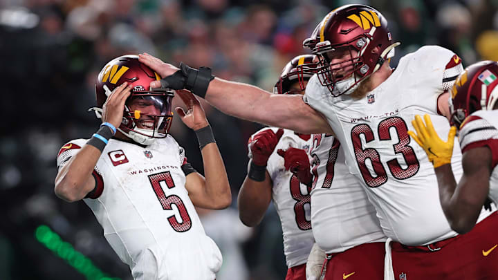Washington Commanders QB Jayden Daniels celebrates after a play against the Philadelphia Eagles.