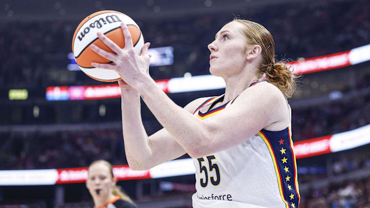 Jul 27, 2025; Chicago, Illinois, USA; Indiana Fever forward Chloe Bibby (55) shoots against the Chicago Sky during the first half at United Center. Mandatory Credit: Kamil Krzaczynski-Imagn Images