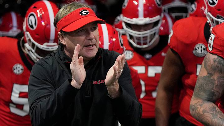 Georgia coach Kirby Smart takes the field with his team before the start of the SEC championship game against Texas in Atlanta, on Saturday, Dec. 7, 2024. Georgia coach Kirby Smart takes the field with his team before the start of the SEC championship game against Texas in Atlanta, on Saturday, Dec. 7, 2024.