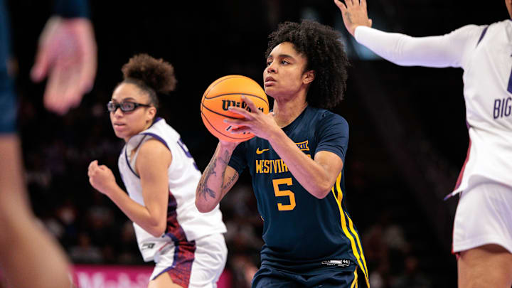 Mar 8, 2026; Kansas City, MO, USA; West Virginia Mountaineers guard Sydney Shaw (5) shoots the ball during the first half against the TCU Horned Frogs at T-Mobile Center. Mandatory Credit: William Purnell-Imagn Images Mar 8, 2026; Kansas City, MO, USA; West Virginia Mountaineers guard Sydney Shaw (5) shoots the ball during the first half against the TCU Horned Frogs at T-Mobile Center. Mandatory Credit: William Purnell-Imagn Images