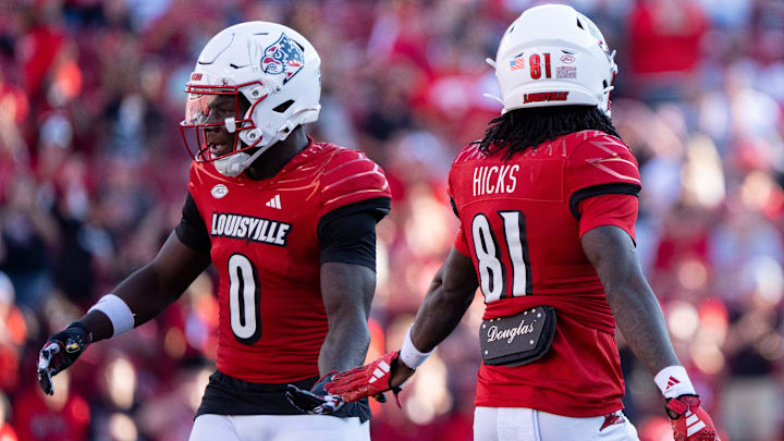 Louisville Cardinals wide receiver Chris Bell Jr. (0) celebrates with Cataurus Hicks (81) on his play during their game against the Jacksonville State Gamecocks on Saturday, Sept. 7, 2024 at L&N Federal Credit Union Stadium in Louisville, Ky.
