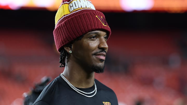 Washington Commanders quarterback Jayden Daniels (5) looks on after the game against the Cincinnati Bengals at Northwest Stadium.