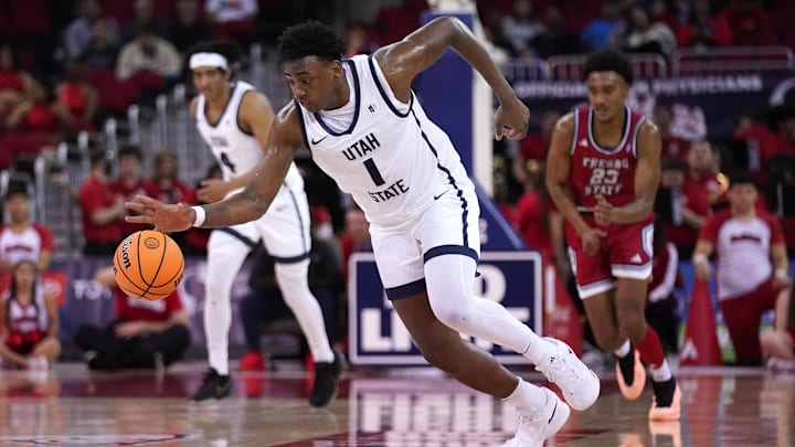 Feb 27, 2024; Fresno, California, USA; Utah State Aggies forward Great Osobor (1) steals the ball
