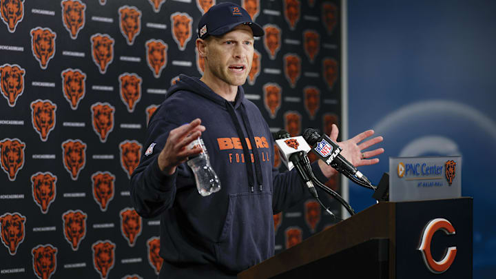 Chicago Bears head coach Ben Johnson (R) speaks during the Rookie Minicamp at Halas Hall.