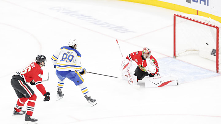 Apr 13, 2026; Chicago, Illinois, USA; Buffalo Sabres right wing Alex Tuch (89) scores a goal against Chicago Blackhawks goaltender Spencer Knight (30) during the third period at United Center. Mandatory Credit: Kamil Krzaczynski-Imagn Images