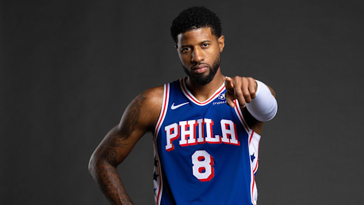 Philadelphia 76ers forward Paul George (8) poses for a photo on media day at the Philadelphia 76ers Training Complex. Mandatory Credit: Bill Streicher-Imagn Images Philadelphia 76ers forward Paul George (8) poses for a photo on media day at the Philadelphia 76ers Training Complex. Mandatory Credit: Bill Streicher-Imagn Images