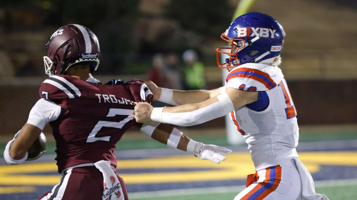 Jenks' Kaydin Jones carries the ball during the Class 6A-1 high school football championship game between Bixby and Jenks Jenks' Kaydin Jones carries the ball during the Class 6A-1 high school football championship game between Bixby and Jenks