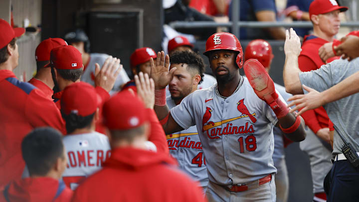 Jun 19, 2025; Chicago, Illinois, USA; St. Louis Cardinals right fielder Jordan Walker (18) celebrates with teammates in the dugout after scoring against the Chicago White Sox during the tenth inning of game two of a doubleheader at Rate Field. Mandatory Credit: Kamil Krzaczynski-Imagn Images