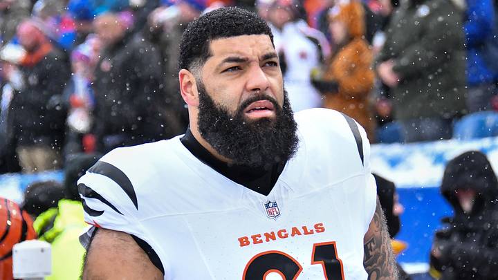 Dec 7, 2025; Orchard Park, New York, USA; Cincinnati Bengals guard Cody Ford (61) on the sidelines before a game against the Buffalo Bills at Highmark Stadium. Mandatory Credit: Mark Konezny-Imagn Images