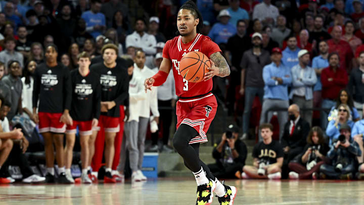 Feb 1, 2025; Houston, Texas, USA; Texas Tech Red Raiders guard Elijah Hawkins (3) brings the ball down court during the first half against the Houston Cougars at Fertitta Center. Mandatory Credit: Maria Lysaker-Imagn Images 