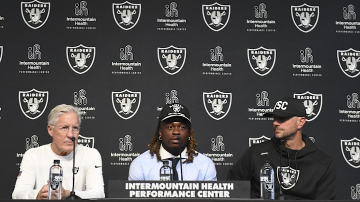 Apr 25, 2025; Henderson, NV, USA; (L-R) Las Vegas Raiders head coach Pete Carroll, Ashton Jeanty and general manager John Spytek during a news conference introducing Jeanty as the first round draft pick in the 2025 NFL Draft at Intermountain Health Performance Center. Mandatory Credit: Candice Ward-Imagn Images