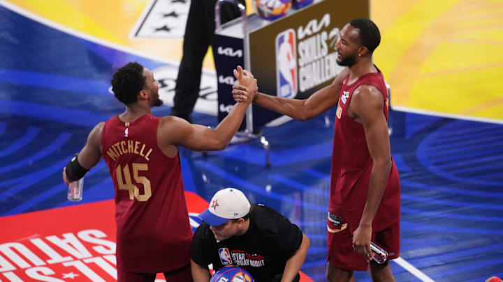 Feb 15, 2025; San Francisco, CA, USA; Team Cavs guard Donovan Mitchell (45) and center Evan Mobley (4) of the Cleveland Cavaliers celebrate after winning the skills challenge during All Star Saturday Night ahead of the 2025 NBA All Star Game at Chase Center. Mandatory Credit: Cary Edmondson-Imagn Images