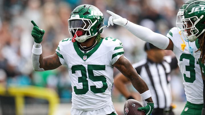 Dec 15, 2024; Jacksonville, Florida, USA; New York Jets safety Jalen Mills (35) celebrates after an interception against the Jacksonville Jaguars in the first quarter at EverBank Stadium. 