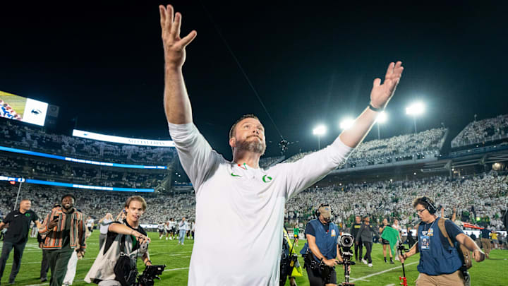 Oregon head coach Dan Lanning celebrates the Ducks’ win as the Oregon Ducks face the Penn State Nittany Lions on Sept. 27, 2025, at Beaver Stadium in University Park, Pennsylvania.