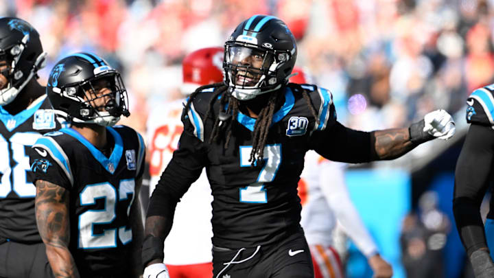 Nov 24, 2024; Charlotte, North Carolina, USA; Carolina Panthers linebacker Jadeveon Clowney (7) reacts after a sack in the second quarter at Bank of America Stadium. Mandatory Credit: Bob Donnan-Imagn Images