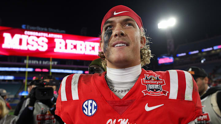 Jan 2, 2025; Jacksonville, FL, USA; Mississippi Rebels quarterback Jaxson Dart (2) celebrates after beating the Duke Blue Devils in the Gator Bowl at EverBank Stadium. 