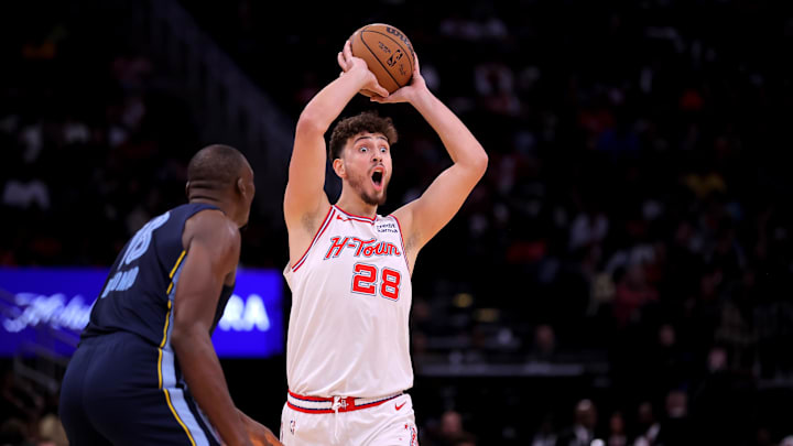 Nov 22, 2023; Houston, Texas, USA; Houston Rockets center Alperen Sengun (28) looks to pass to a teammate against the Memphis Grizzlies during the third quarter at Toyota Center. Mandatory Credit: Erik Williams-Imagn Images
